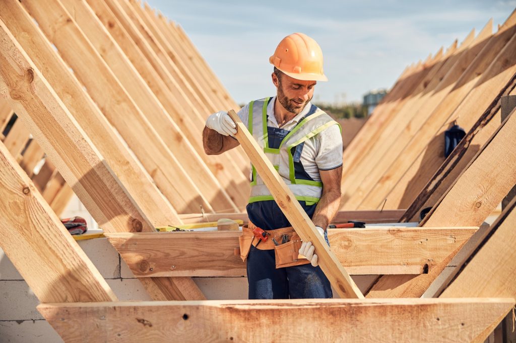 Builder working on roof
